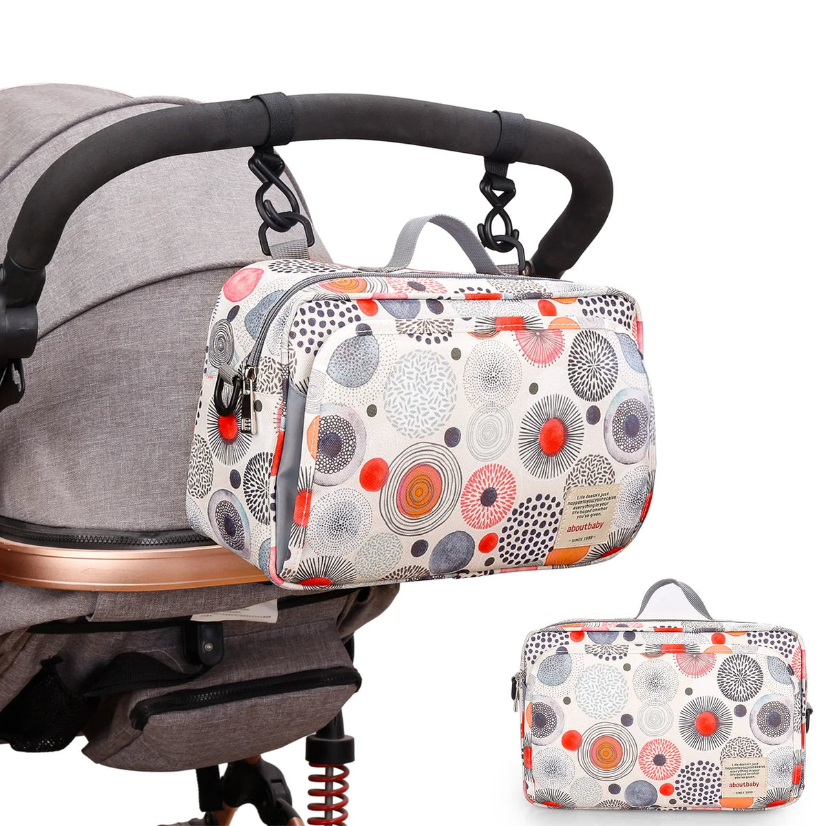 Sac à langer multifonctionnel fixé à la poignée d’une poussette